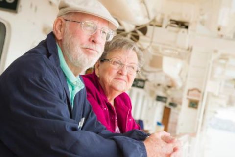 grandparents standing in a balcony